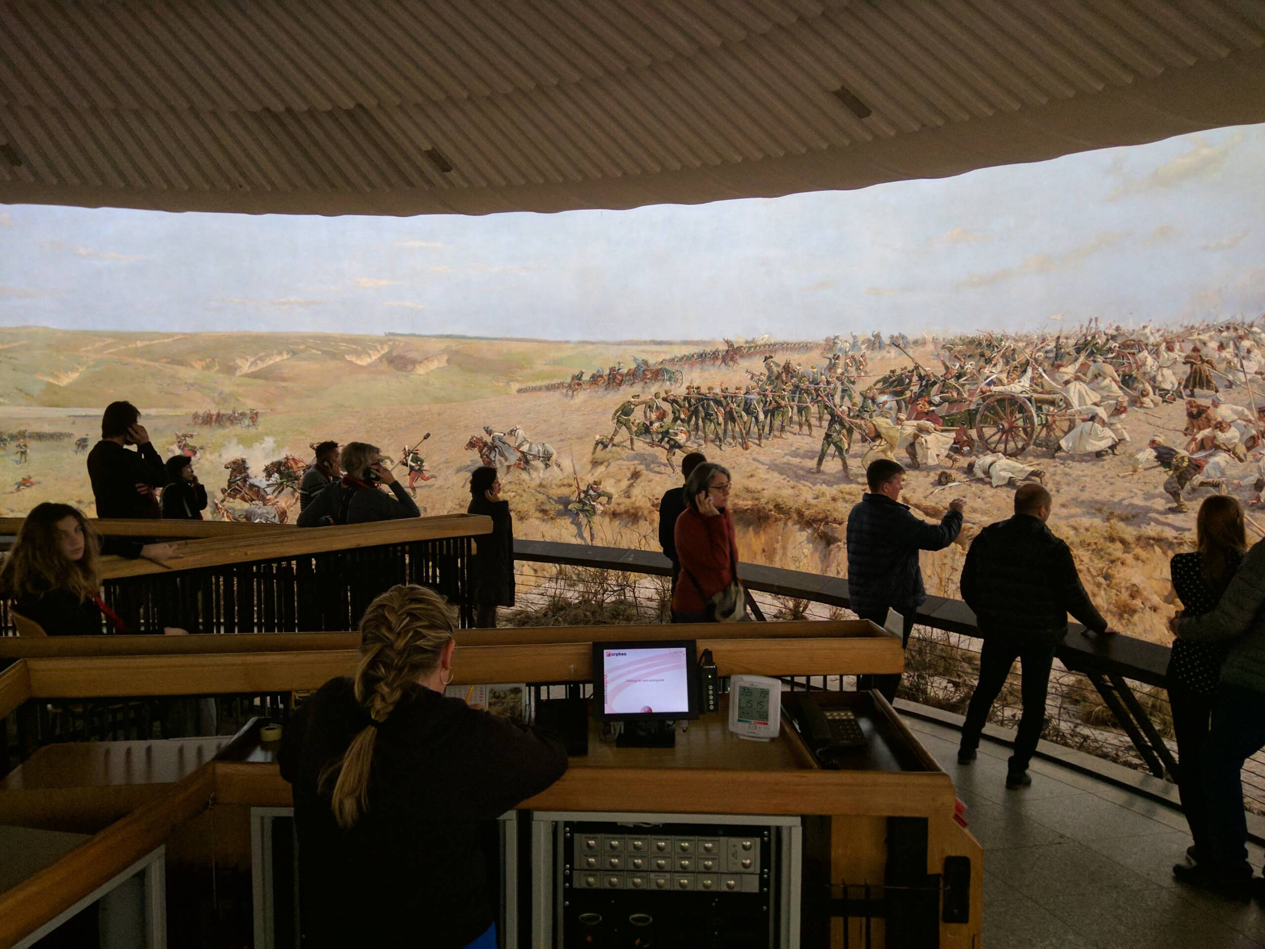 Visitors on the viewing platform inside the Racławice Panorama rotunda in Wrocław
